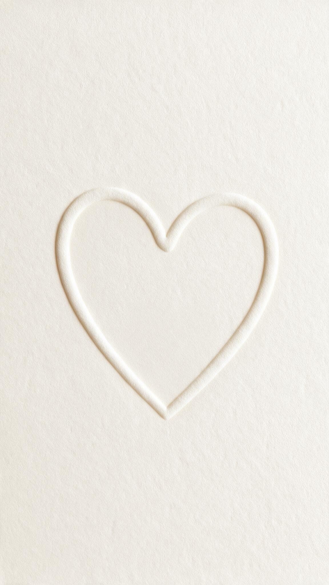 Interactive Scratch save the date: a cream card with a gold foil heart